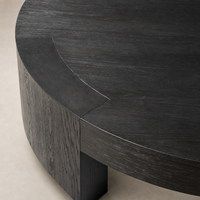 Hastings Coffee Table in Charcoal Oak with smooth, rounded edges and rich texture.
