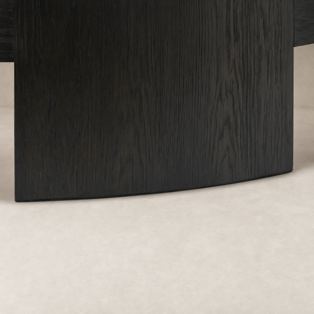 Hastings Coffee Table in charcoal oak featuring a sleek curved edge design.
