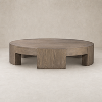 Hastings Coffee Table in warm natural flat oak with a round design and clean lines.