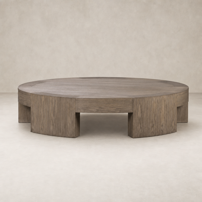 Hastings Coffee Table in warm natural flat oak with a sleek circular design.