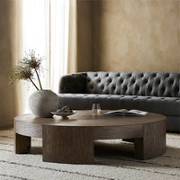 Hastings Coffee Table in warm natural flat oak with a modern circular design.