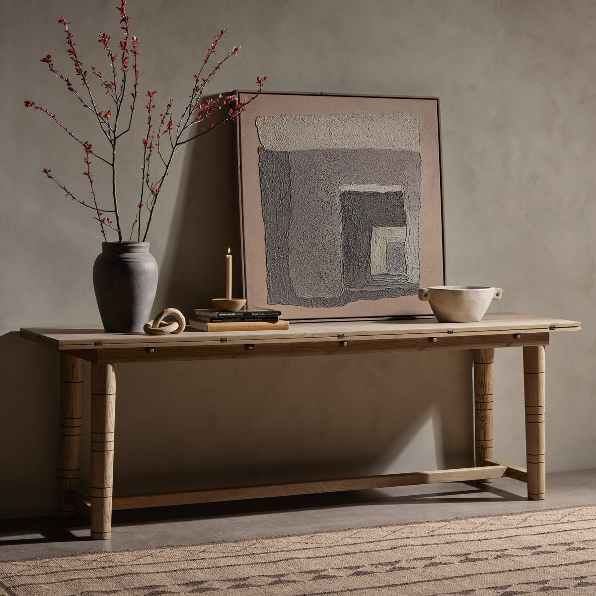 Aspen Top Console Table in Toasted Ash with detailed legs and minimalist decor.