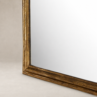 Antiqued Gold Leaf Antonia Floor Mirror with ornate textured frame detail.