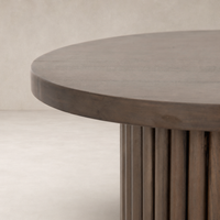 Round Ashford End Table featuring a textured wooden finish and ribbed detailing.
