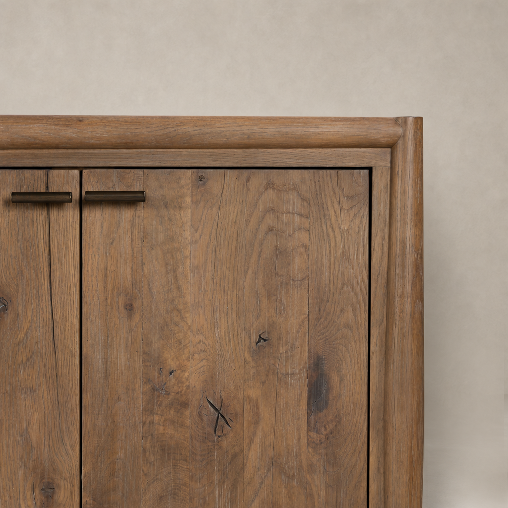 Belmont 6 Door Sideboard in weathered oak featuring a smooth, textured surface and sturdy metal handles.