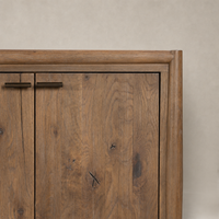 Belmont 6 Door Sideboard in weathered oak featuring a smooth, textured surface and sturdy metal handles.
