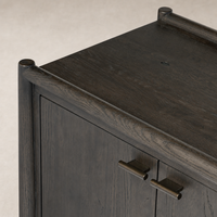 Close-up of the Belmont 6 Door Sideboard in Smoked Black Resawn Oak, highlighting the elegant finish and sleek handles.