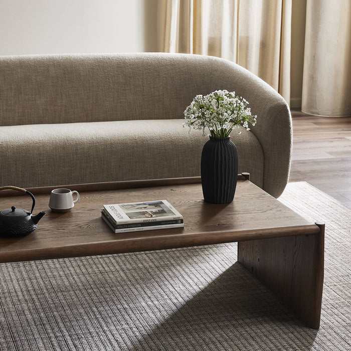 Fairview Coffee Table in weathered oak, showcasing a sleek design and natural finish.