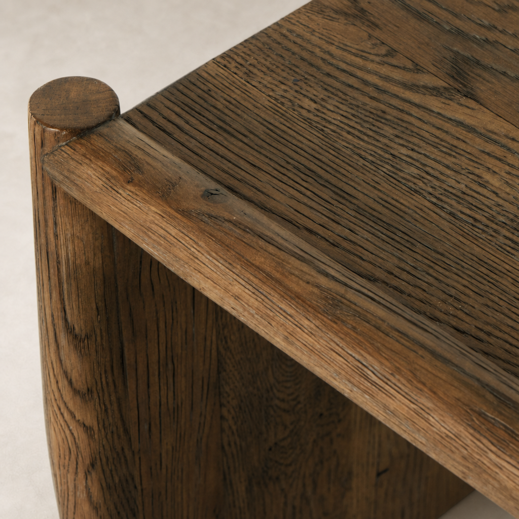 Weathered Oak Fairview Coffee Table showcasing its textured surface and smooth round edges.