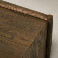 Fairview Coffee Table in weathered oak showcasing textured wood grain and smooth edges.