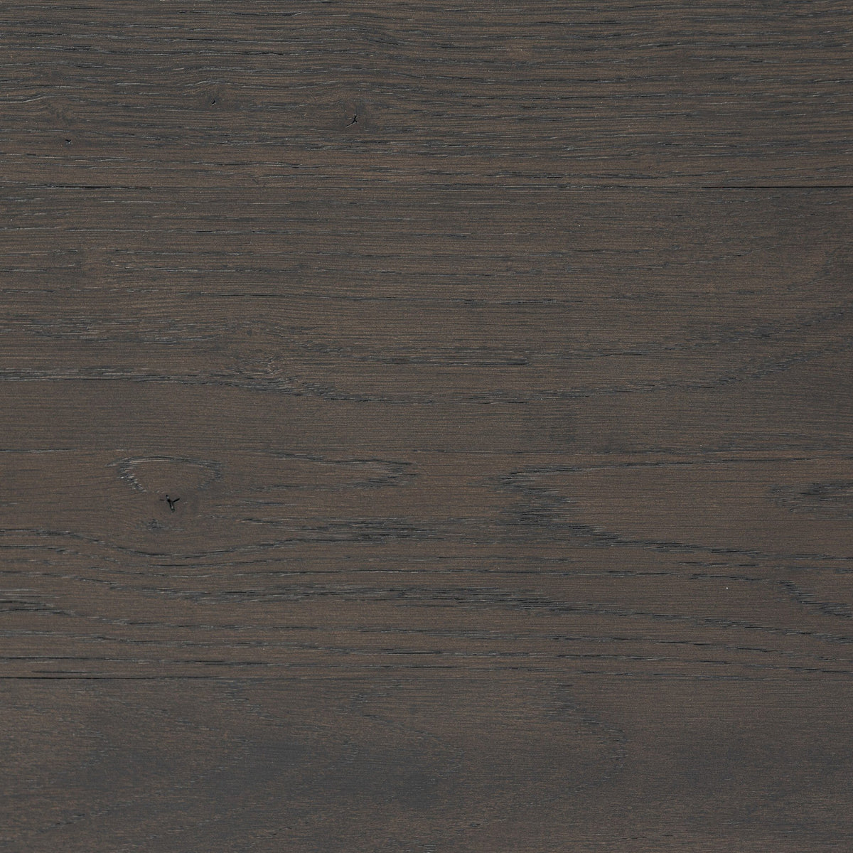 Fairview Coffee Table in smoked black resawn oak, showcasing rich texture and grain details.