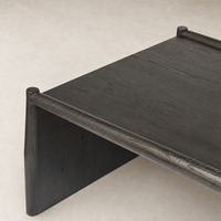 Fairview Coffee Table in smoked black resawn oak with unique rounded edges.