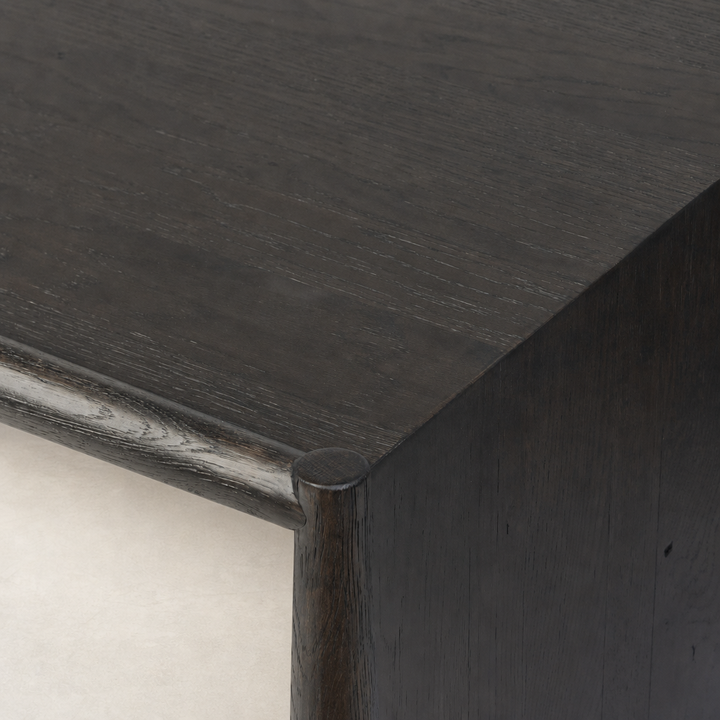 Close-up of Fairview Coffee Table in Smoked Black Resawn Oak with rounded edges.