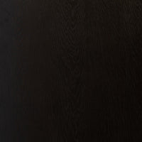 Charcoal Oak surface of Uma Desk showcasing rich wood grain texture.