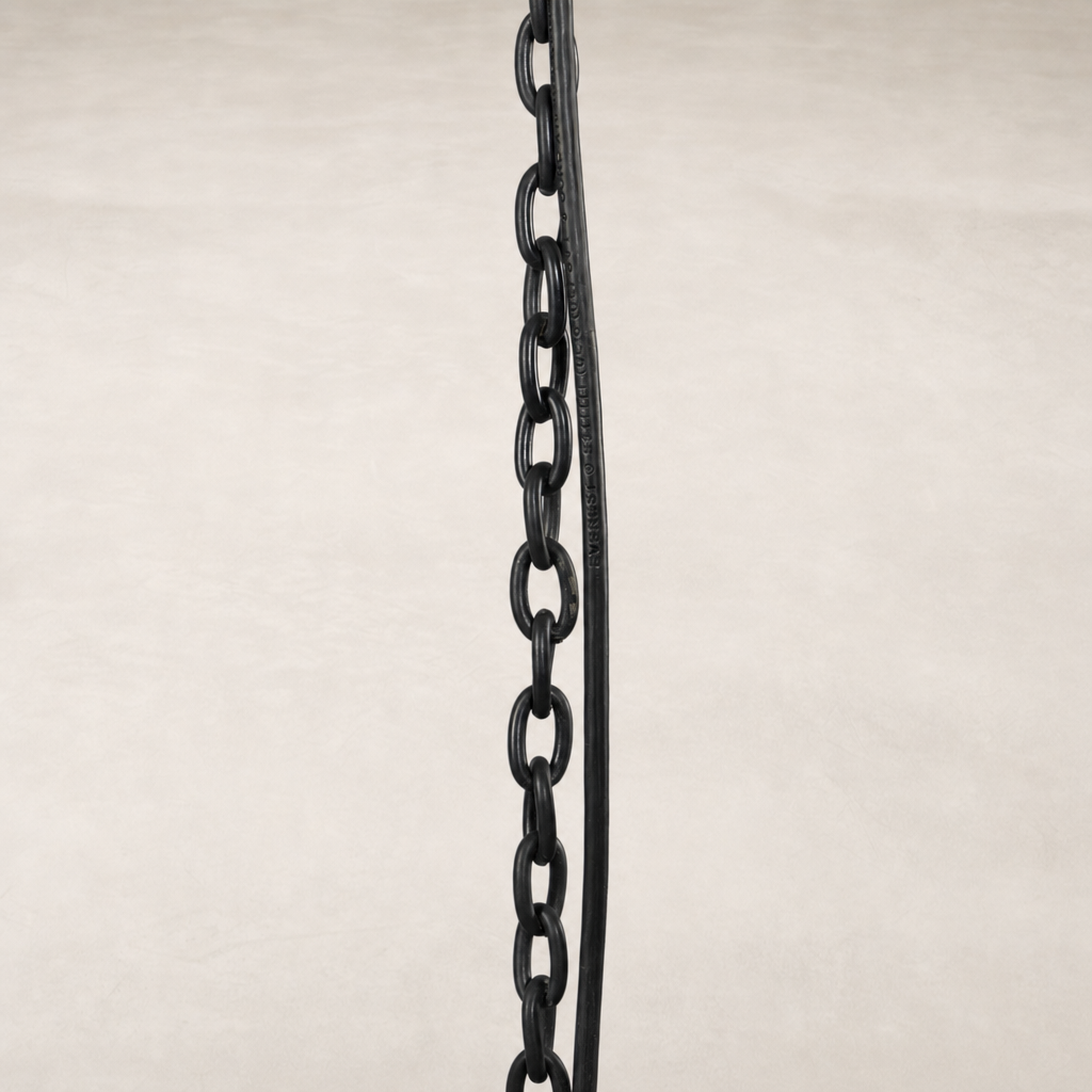 Antiqued iron chandelier chain featuring linked design and distinct textured finish.