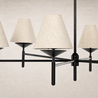 Jet black chandelier with conical fabric shades and sleek metal frame.