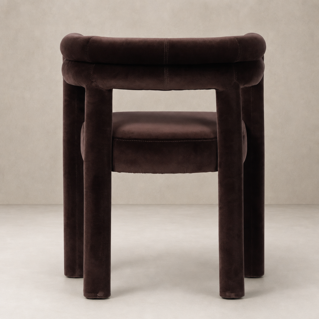 Tivoli Dining Chair in Surrey Cocoa with a sleek, rounded design and soft texture.