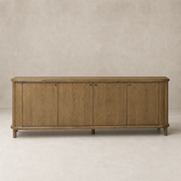 Laurent Sideboard in Amber Oak featuring rounded edges and multiple storage compartments.