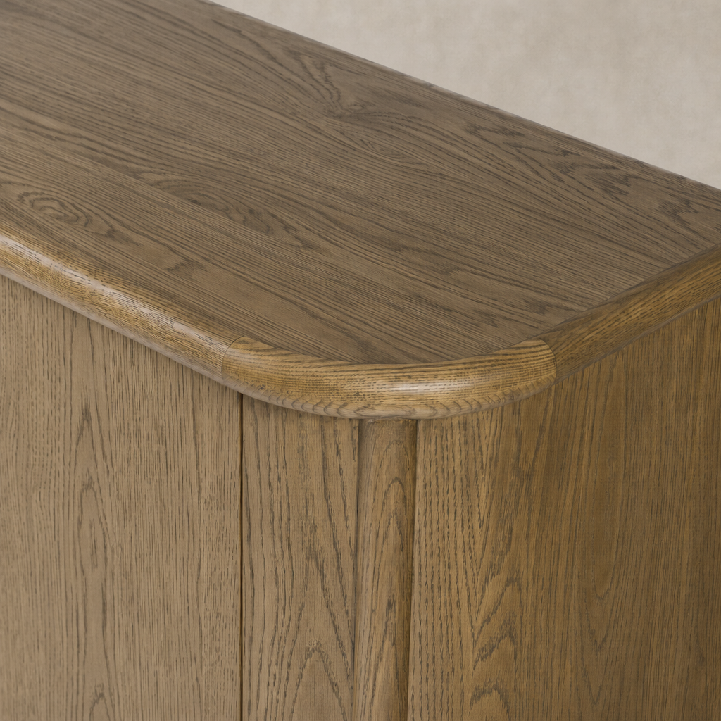 Close-up of the Laurent Sideboard in Amber Oak showcasing the smooth, rounded edges.