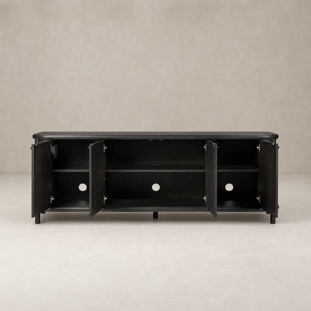 Smoked black solid Laurent sideboard featuring sleek doors and open shelving.