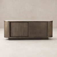 Eleni Sideboard in weathered dark oak with rounded edges and sliding doors.
