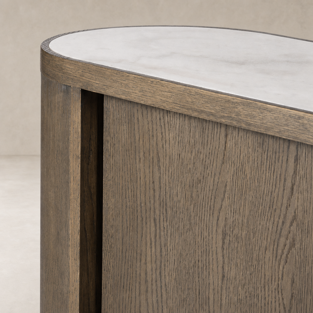 Eleni Sideboard in weathered dark oak with smooth curved edges and soft finish.