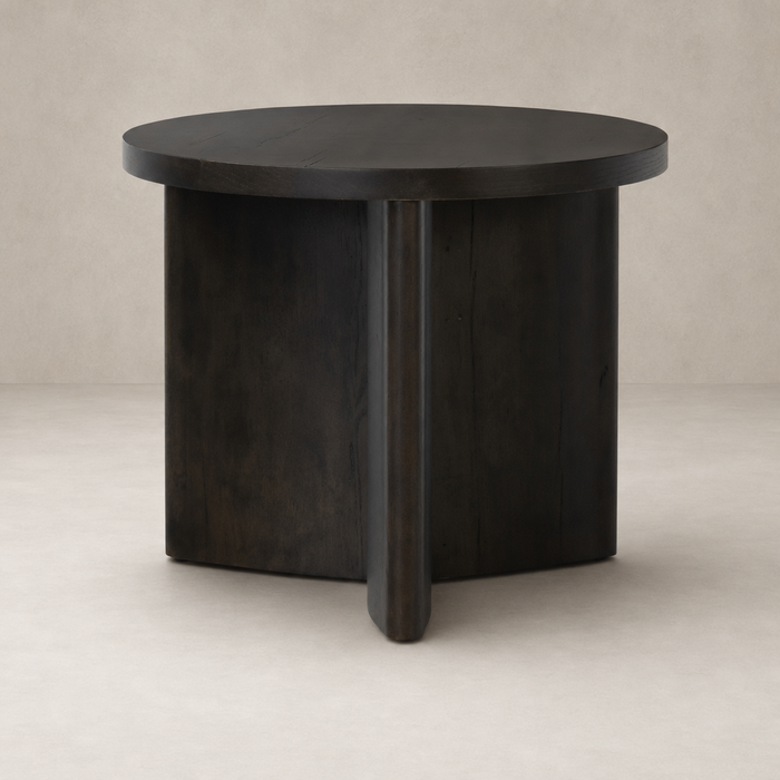 Rumi End Table featuring a sleek round top and a modern, dark wood finish.