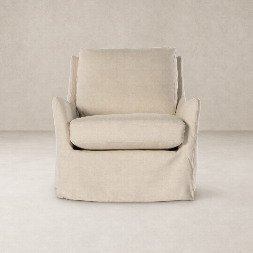Carmel Slipcover Swivel Chair in Brussels Natural with plush cushions and soft fabric.