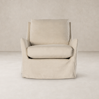 Carmel Slipcover Swivel Chair in Brussels Natural with plush cushions and soft fabric.