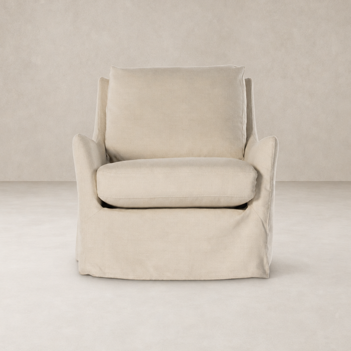 Carmel Slipcover Swivel Chair in Brussels Natural with plush cushions and soft fabric.