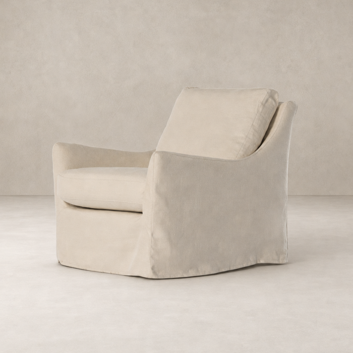 Carmel Slipcover Swivel Chair in Brussels Natural with soft fabric and ergonomic design.