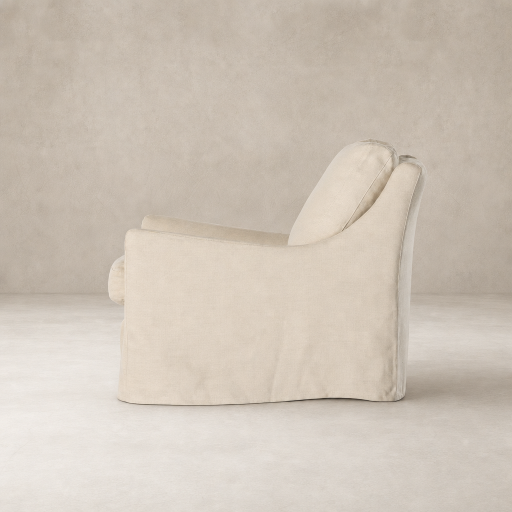 Carmel Slipcover Swivel Chair in Brussels Natural with a sleek, modern design.