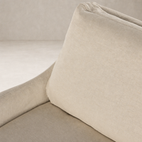 Carmel Slipcover Swivel Chair in Brussels Natural showcasing soft, textured fabric and sleek design.
