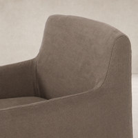 Brussels Mushroom slipcover dining chair with soft fabric and elegant curved design.