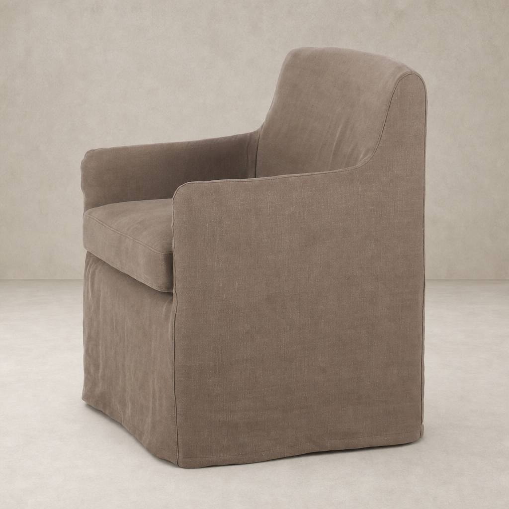 Slipcover dining chair in Brussels Mushroom color, featuring a contemporary design and soft upholstery.