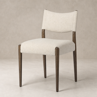 Mira Armless Dining Chair in Antwerp Natural with soft fabric and stylish wood legs.
