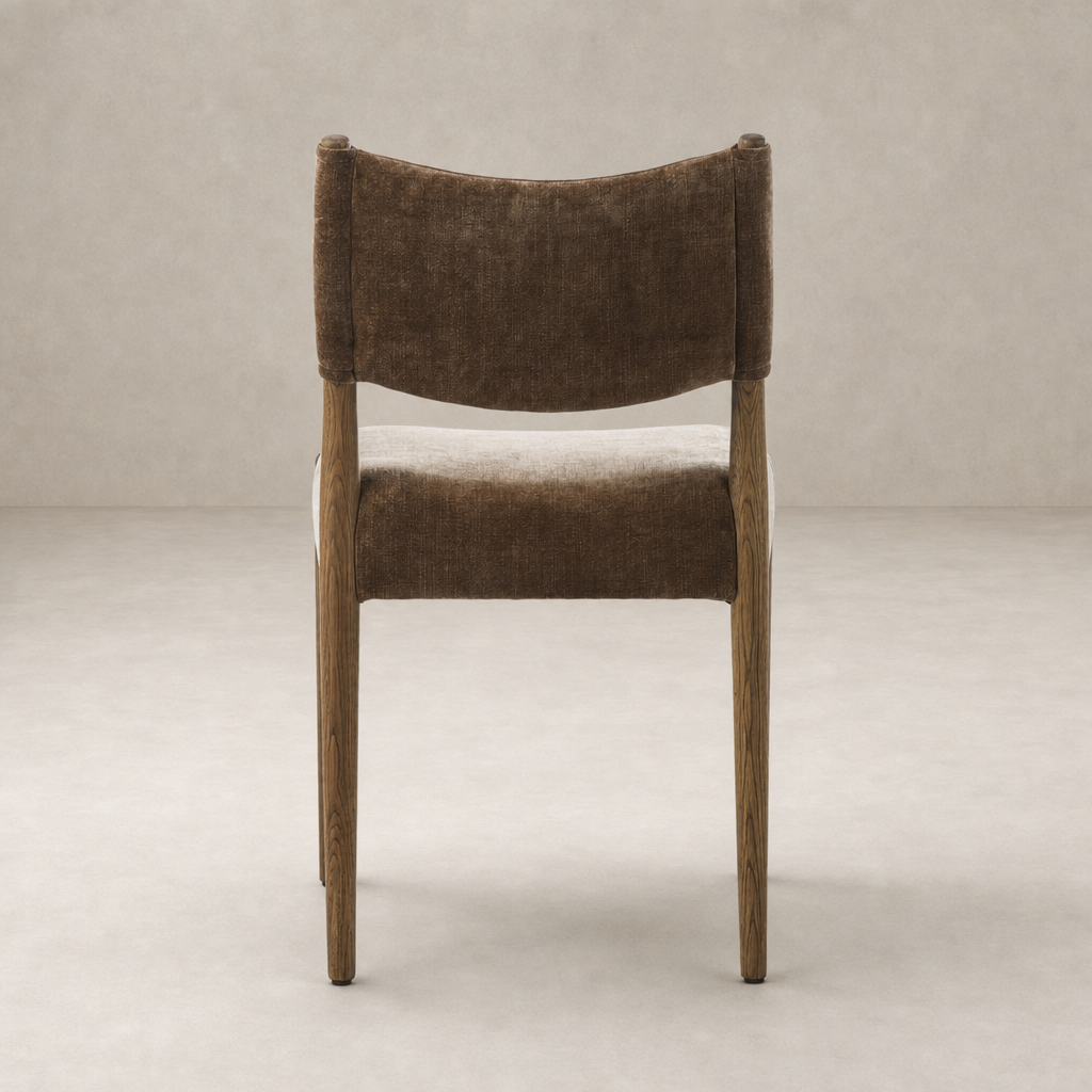 Mira Armless Dining Chair in Altair Mushroom showcasing smooth fabric and elegant wooden legs.