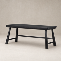 Worn Black Acacia Koa Desk with sleek lines and sturdy legs in a clean studio setting.