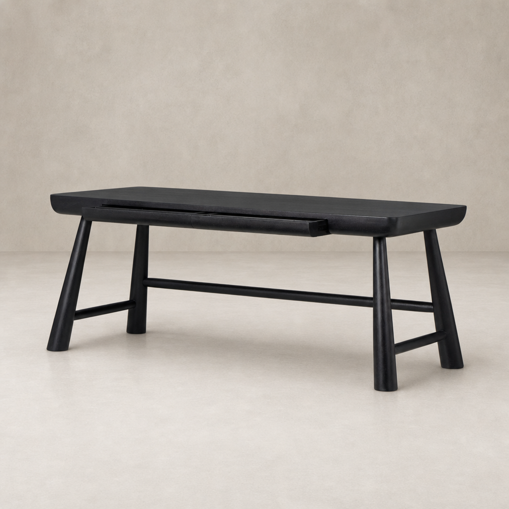 Koa Desk in worn black acacia features sleek lines and a modern design.