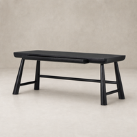 Koa Desk in worn black acacia features sleek lines and a modern design.