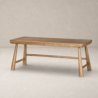 Koa Desk in caramel rubberwood featuring a sleek tabletop and sturdy legs.