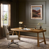 Koa Desk in caramel rubberwood with sleek design and stylish room setting.