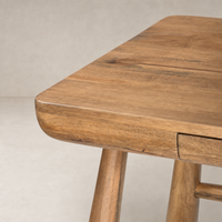 Caramel Rubberwood Koa Desk corner featuring smooth edges and sturdy legs.