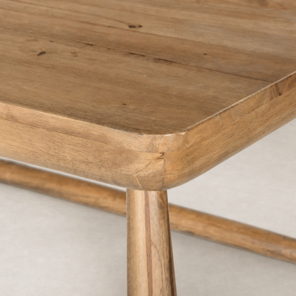 Close-up of the Koa Desk featuring caramel rubberwood with a smooth, polished finish.