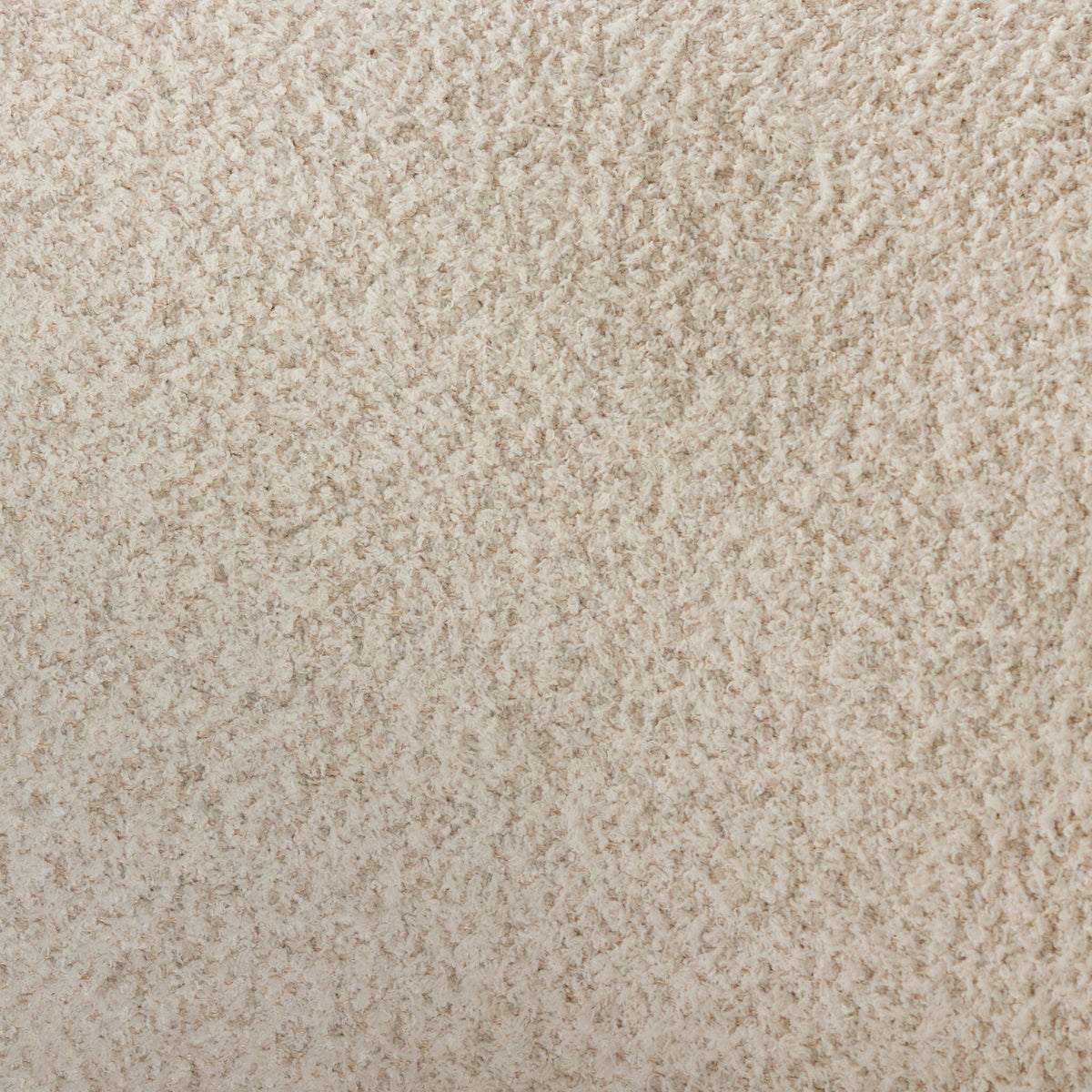Close-up of the soft, textured Sheldon Ivory fabric for the Poppy Swivel Chair.