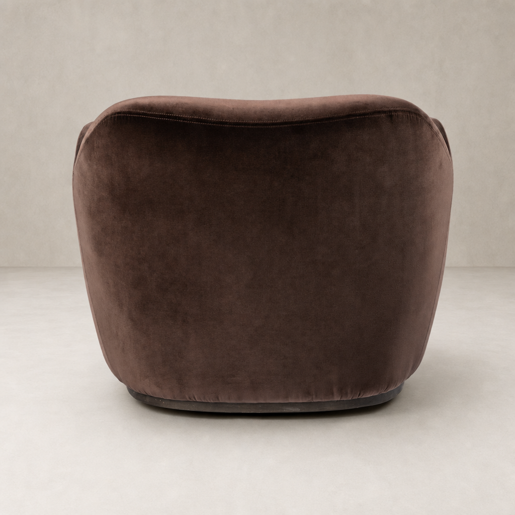 Poppy Swivel Chair in Surrey Cocoa with plush, rounded back and smooth finish.