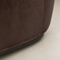 Close-up of the Poppy Swivel Chair in Surrey Cocoa with soft, textured fabric finish.