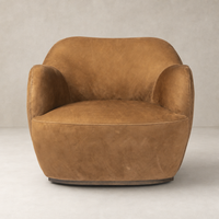 Poppy Swivel Chair in Nubuck Cognac features a rounded, plush design with soft upholstery.