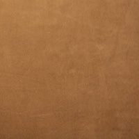 Nubuck cognac texture of the Poppy Swivel Chair, showcasing its soft finish.