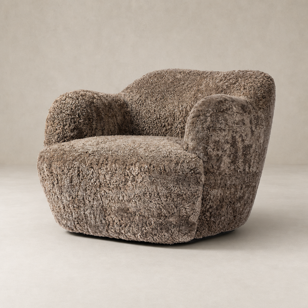 Taupe shearling Poppy Swivel Chair with a plush, rounded shape and cozy texture.